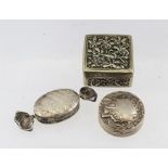 THREE SILVER PILL BOXES, of various designs, includes one of wrapped bon-bon design