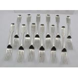 CHAWNER & CO. (George William Adams) A SET OF TWELVE SILVER "FIDDLE" PATTERN TABLE FORKS, engraved