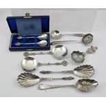 WILLIAM HUTTON & SONS LTD A PAIR OF EDWARDIAN SILVER SERVING SPOONS with cast handles and plain