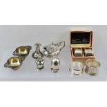 AN ASSORTMENT OF SILVER AND SILVER COLOURED METAL ITEMS to include; an embossed silver mustard,