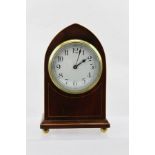 AN EDWARDIAN MAHOGANY CASED LANCET DESIGN MANTEL TIME PIECE the white enamel dial with Arabic