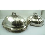 TWO OLD SHEFFIELD PLATE MEAT COVER DOMES with decoratively cast handles, the smaller one bears