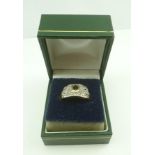 AN 18CT GOLD LADIES STONE SET DRESS RING, size "U"