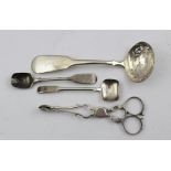 A MIXED LOT OF SILVER ITEMS to include; a pair of George III silver sugar nips, London 1802,