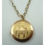 A LOCKET with engine turned decoration, on a 9CT. BELCHER CHAIN