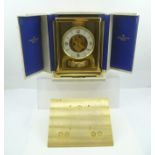 A "JAEGER-LE-COULTRE" ATMOS CLOCK, the dial with Arabic numerals at the quarters, 22cm high, in