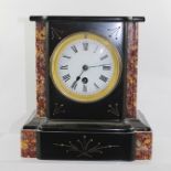A VICTORIAN BLACK SLATE CASED TIME PIECE, the white enamel dial with Roman numerals, 22.5cm high