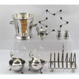 A DANISH SILVER PLATED TAPER STICK HOLDER of star form, together with a silver plated ICE BUCKET,