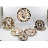A QUANTITY OF ROYAL CROWN DERBY IMARI PATTERN PLATES AND STANDS (eight items in all)