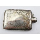 MARK OBSCURED A 1920's RECTANGULAR SILVER SPIRIT FLASK having knurled screw cap and un-engraved