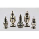 MIXED ASSAYS TWO PAIRS OF VICTORIAN SILVER PEDESTAL PEPPERETTES Birmingham 1899 and another single
