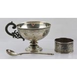 A 19TH CENTURY RUSSIAN SILVER PEDESTAL CUP having scroll handle and engraved belly, later