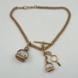 A LATE 19TH/EARLY 20TH CENTURY ROSE GOLD 9CT DOUBLE ALBERT having curb link chain, dog clip