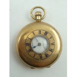THOMAS RUSSELL & SON, LIVERPOOL A 9CT GOLD DEMI-HUNTER POCKET WATCH, having calibrated cover,