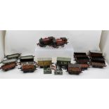 HORNBY "0" GAUGE CLOCKWORK TRAIN SET including two type 40 Locomotives 0-4-0 (reversing) in maroon