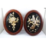 TWO JAPANESE MEIJI PERIOD OVAL LACQUER PANELS, one inset carved bone floral decoration, the other