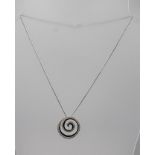 A WHITE GOLD MULTI DIAMOND SWIRL PENDANT AND CHAIN