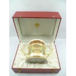 A "SPODE" LIMITED EDITION BONE CHINA TWO HANDLED COMMEMORATIVE TANKARD concerning HM Queen Elizabeth