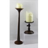 TWO TURNED WOOD CANDLE STANDS, one 19th century adjustable, the other 20th century static, 52cm high