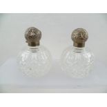 ROBERT PRINGLE AND SONS A PAIR OF EDWARDIAN SILVER MOUNTED "GRENADE" FORM DRESSING TABLE BOTTLES,