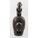 A CENTRAL AFRICAN, LUBA OR BAKONGO TRIBE, CARVED WOOD RITUAL BELL, having a kneeling female form