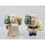 TWO GLAZED EARTHENWARE FIGURES OF FATHER CHRISTMAS IN THE FORM OF TREE DECORATIONS, 9cm high