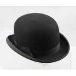 A THATCH BOWLER HAT bearing the retailer's label "Simpson of Piccadilly, The Chequer"