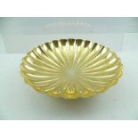 A "GARRARD & CO" OF LONDON "REGENT PLATE" GILDED BOWL of shallow fluted form, raised on a circular