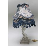 AN ART DECO LALIQUE STYLE FROSTED GLASS TABLE LAMP formed as a kneeling young woman supporting the