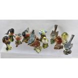 A COLLECTION OF TWELVE "BESWICK" CERAMIC GARDEN BIRDS, to include a Robin, Wren and Greenfinch etc.