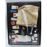 A GLAZED WALL CASE OF WRITING RELATED MATERIAL, includes a quill pen, seal impressions and