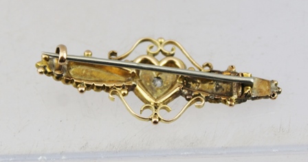 A VICTORIAN GOLD BAR BROOCH set central diamond within a heart and scrolled frame - Image 2 of 3