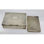 WILLIAM ADAMS LTD. A 20TH CENTURY SILVER CIGARETTE BOX, having engine turned hinged cover,