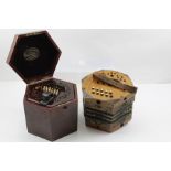 A "LACHENAL" CONCERTINA of rosewood hexagonal form with rosewood carrying case, bears label inside