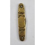 A LATE 19TH CENTURY BRASS SIDED FOLDING STEEL POCKET KNIFE, decorated to both sides with portraits