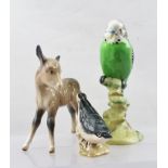 THREE BESWICK EARTHENWARE FIGURES, "Budgie" No.1217, 17cm high, a "Donkey Foal", 14cm, and a "
