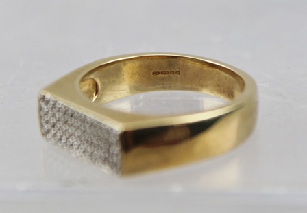 A HEAVY 9CT GOLD RING set with sixty small diamonds within a central flat tablet, size T - Image 2 of 2