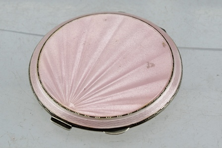HENRY CLIFFORD DAVIS A MID 20TH CENTURY SILVER AND PINK GUILLOCHE ENAMEL POWDER COMPACT, the
