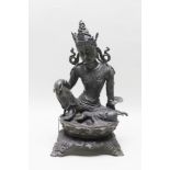 A CHINESE QING DYNASTY BRONZE BODHISATTVA, seated position with hands in the Mudra positions,