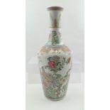 A CHINESE QING DYNASTY PORCELAIN VASE, of Yaolinzun (mallet shape), the neck with a flared rim, hand