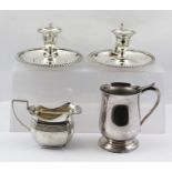 A PAIR OF GEORGIAN DESIGN SILVER PLATED CHAMBER STICKS with removable drip pans and snuffers,