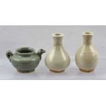 A CHINESE SMALL POT with handle and spout, possibly Longquan celadon, 5cm high, together with two