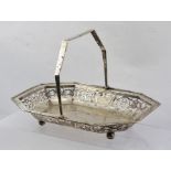 J** COLLYER & CO. A SILVER FRUIT BASKET, having octahedral border with foliate fretted belly and