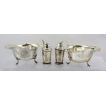 MAPPIN & WEBB A PAIR OF CHIPPENDALE STYLE SILVER SAUCE BOATS, each having a cut rim, plain loop