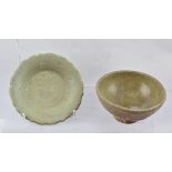 TWO CHINESE CELADON GLAZED ITEMS OF POTTERY, possibly Ming Dynasty, includes an incised decorated