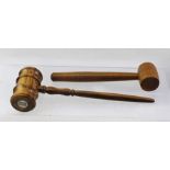 A TURNED OLIVE WOOD AUCTIONEER'S GAVEL, 25cm long overall, together with one other smaller GAVEL (2)