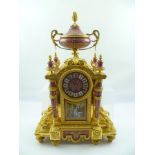 LE ROY ET FILS A LATE 19TH/EARLY 20TH CENTURY FRENCH GILT BRASS MANTEL CLOCK, having puce