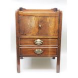 A GEORGIAN MAHOGANY TRAY TOP COMMODE of standard form and design, having twin plain cupboard