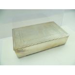 ROBERTS & BELK A RECTANGULAR SILVER TABLE TOP CIGARETTE BOX, having inscribed top "To Colonel W.T.R.