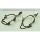 A PAIR OF PLATED AMERICAN WESTERN SPURS with cast horse head and shoe decoration, ten rowel